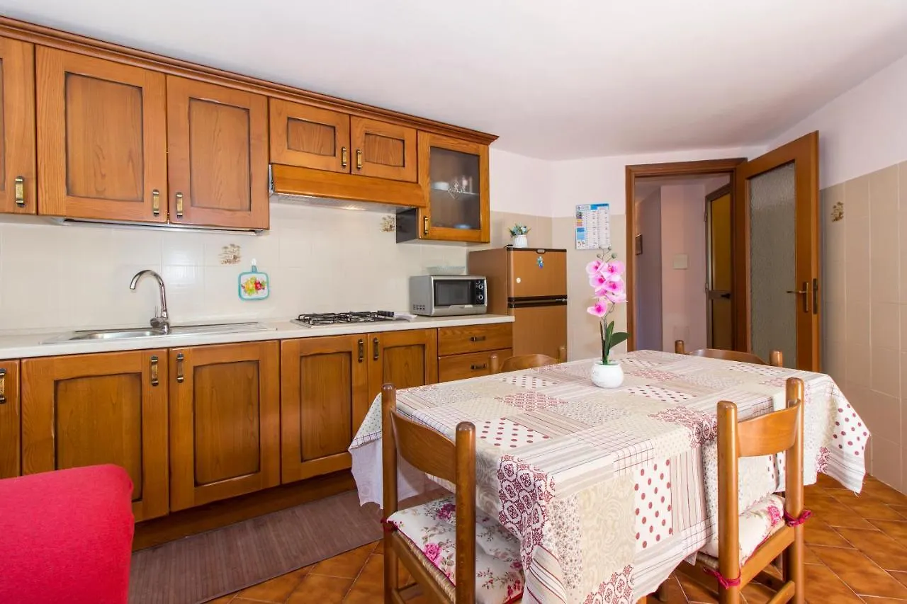Appartamenti In Villa Con Ampio Giardino Esterno Посада